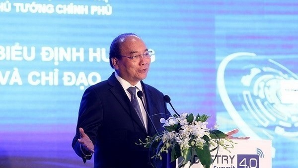 Le PM vietnamien Nguyên Xuân Phuc lors du dialogue de politiques dans le cadre du Sommet de l'industrie 4.0. Photo: VNA.