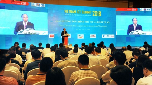 Le PM Nguyên Xuân Phuc prend la parole lors de Vietnam ICT Summit 2018, le 18 juillet à Hanoi. Photo : Trân Hai/NDEL.