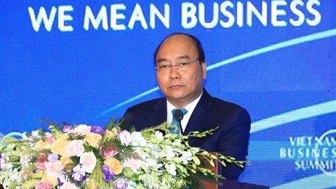 Le PM vietnamien Nguyên Xuân Phuc s’adresse au Sommet des entreprises du Vietnam 2018, le 13 septembre à Hanoi. Photo: VNA.
