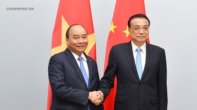 Le PM vietnamien Nguyên Xuân Phuc (à gauche) et son homologue chinois Li Keqiang. Photo : VGP. 