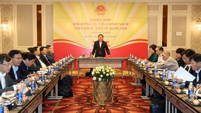 Vue générale de la réunion bilan du Conseil consultatif national sur la politique financière et monétaire, le 12 janvier à Dà Nang. Photo : VGP.