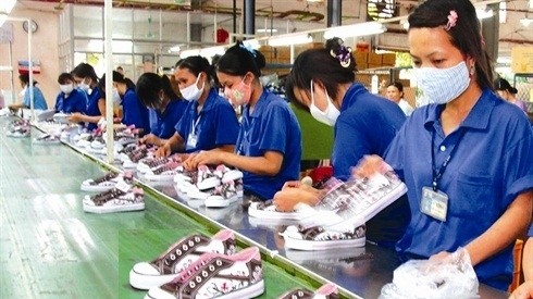 Aujourd’hui, le Vietnam est l’un des 10 premiers producteurs et exportateurs mondiaux de chaussures et de produits en cuir. Photo: VNA.