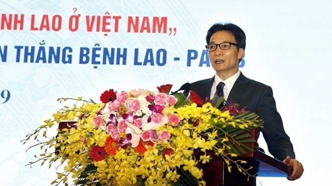 Le Vice-Premier ministre Vu Duc Dam à l'événement en écho à la Journée mondiale de lutte contre la tuberculose. Photo : VNA.
