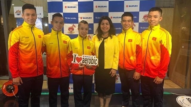 Des gymnastes vietnamiens ont remporté des médailles d'or lors de la Coupe du Monde de Gymnastique Aérobic Suzuki 2019. Photo : NDEL.