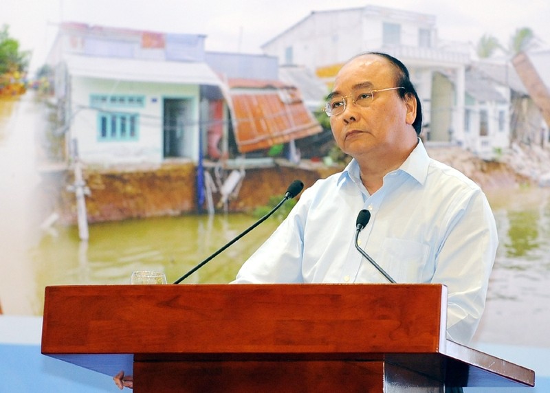 Le PM Nguyên Xuân Phuc lors de la conférence-bilan en ligne sur les travaux de réponse aux incidents, aux catastrophes naturelles, de recherche et de sauvetage au cours de l'année 2018. Photo : Trân Hai/NDEL.