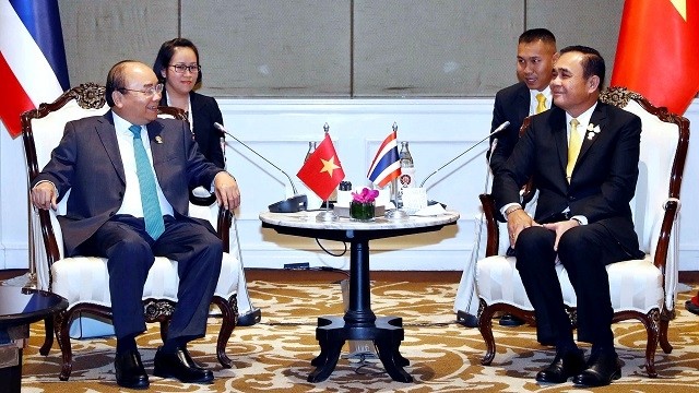 Le PM vietnamien Nguyên Xuân Phuc (à gauche) et son homologue thaïlandais Prayuth Chan-ocha, le 22 juin à Bangkok. Photo : VGP.