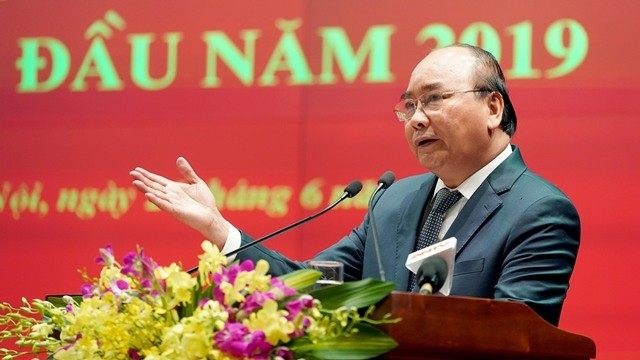 Le PM Nguyên Xuân Phuc prend la parole lors de la conférence. Photo : VGP.