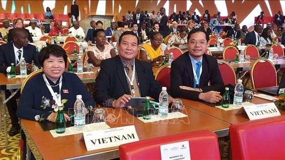 La délégation vietnamienne lors de la 45e Assemblée générale de l’APF en Côte d’Ivoire. Photo : VNA.