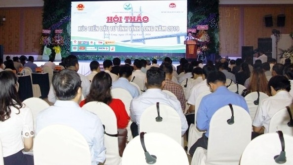 Lors du colloque de promotion de l’investissement à Vinh Long 2019. Photo : NDEL.