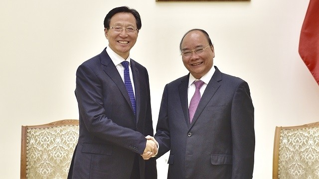 Le PM vietnamien Nguyên Xuân Phuc (à droite) et le ministre chinois de l'Agriculture et des Affaires rurales Han Changfu, le 14 octobre à Hanoi. Photo : Trân Hai/NDEL.
