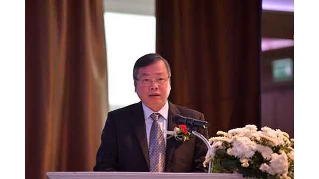 Le vice-président du Comité populaire de la province de Binh Phuoc, Huynh Anh Minh, lors du séminaire tenu le 17 octobre à Bangkok. Photo : VNA.  