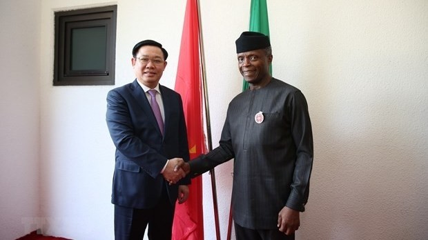 Le Vice-PM Vuong Dinh Huê (à gauche) et le Vice-Président de la République fédérale du Nigeria Yeni Osinbajo. Photo : VNA.