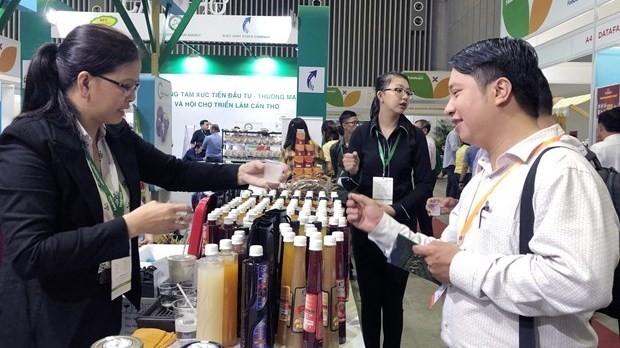 Les visiteurs à la L’Exposition internationale sur l'industrie alimentaire vietnamienne 2019 - Vietnam Foodexpo 2019. Photo : VNA.