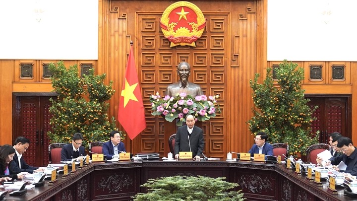 Le Premier ministre Nguyên Xuân Phuc s’exprime lors de la réunion, le 20 janvier à Hanoi. Photo : Trân Hai/NDEL.