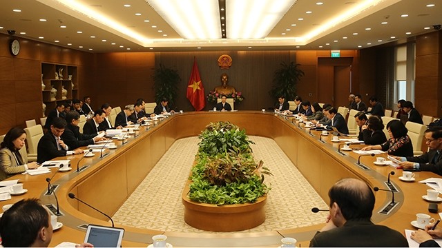 Réunion du Comité national de prévention et de contrôle du Covid-19, le 22 février à Hanoi. Photo : VNA. 