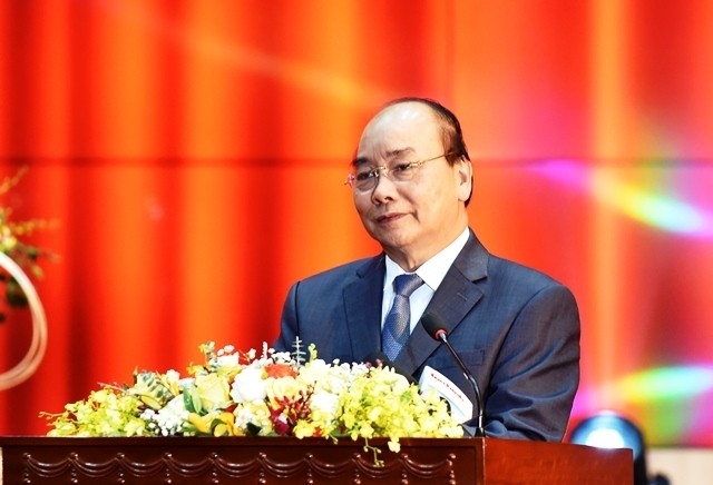 Le Premier ministre Nguyên Xuân Phuc prend sa parole lors de la vidéoconférence, le 26 février à Hanoi. Photo : NDEL.