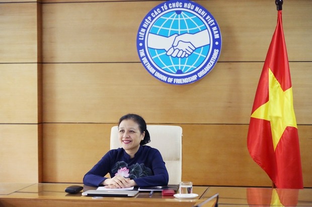 La présidente de l’Union des organisations d’amitié du Vietnam, Nguyên Phuong Nga, lors de la visioconférence. Photo : thoidai.com.vn.