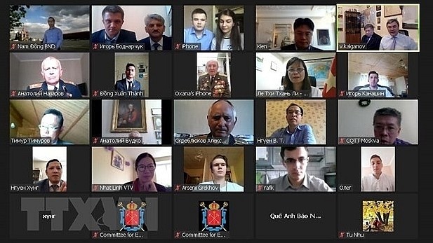 Les participants de la conférence en ligne. Photo : VNA.