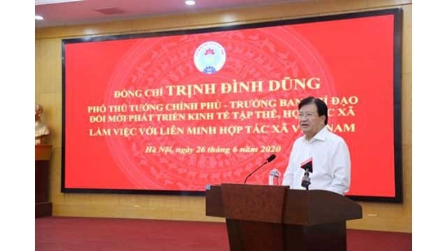 Le Vice-Premier ministre Trinh Dinh Dung s'exprime lors de l'événement. Photo : NDEL.