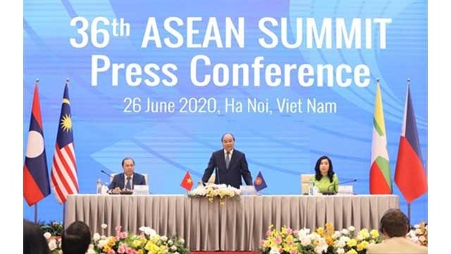 Le Premier ministre (PM) vietnamien Nguyên Xuân Phuc lors de la conférence de presse internationale à Hanoi, le 26 juin. Photo : VNA/CVN.