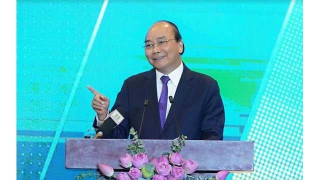 Le Premier ministre Nguyên Xuân Phuc s'exprime lors d’une Conférence « Hanoi 2020 – Coopération, Investissement et Développement ». Photo : VOV.
