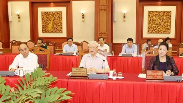 De gauche à droite : le Premier ministre Nguyên Xuân Phuc, le Secrétaire général et Président Nguyên Phu Trong et la Présidente de l’Assemblée nationale Nguyên Thi Kim Ngân, lundi 21 septembre. Photo : VNA.