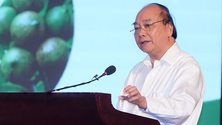 Le Premier ministre Nguyên Xuân Phuc lors de la conférence sur le développement de la macadamia, le 29 septembre. Photo : VGP.