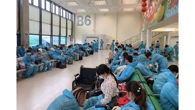Les citoyens vietnamiens à un aéroport de Taïwan (Chine).  Photo : HNM.