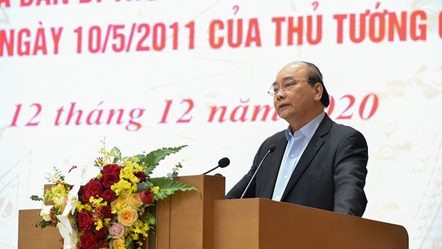 Le Premier ministre Nguyên Xuân Phuc s’adresse à la téléconférence nationale, le 12 décembre. Photo : VGP.