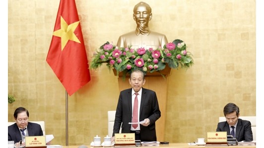 Le Vice-Premier ministre permanent du Vietnam, Truong Hoa Binh, prend la parole lors de la visioconférence. Photo : VGP.