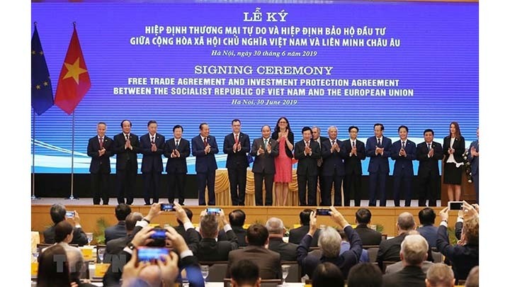 La cérémonie de signature de l'EVFTA et de l'EVIPA à Hanoi en 2019. Photo : https://congthuong.vn/