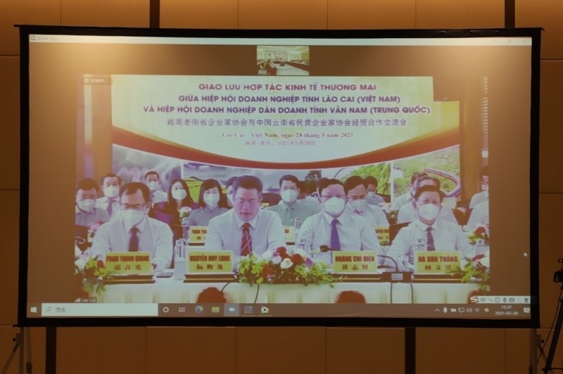 Des entreprises de Lào Cai participent au visioconférence. Photo : BQT.