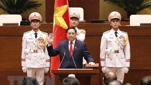 Le Premier ministre Pham Minh Chinh prête serment devant l’Assemblée nationale, les compatriotes et les électeurs vietnamiens. Photo : VNA.