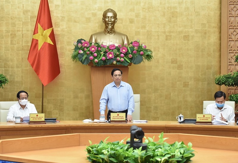 Le Premier ministre Pham Minh Chinh lors de la réunion périodique du gouvernement, tenue en visioconférence. Photo : Trân Hai/NDEL.