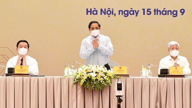 La conférence est organisée sous l’égide du Premier ministre Pham Minh Chinh. Photo : Trân Hai/NDEL.