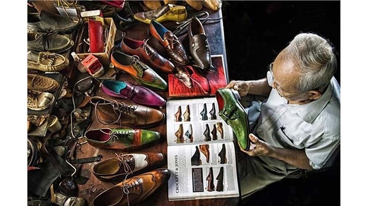 La photo « 90-year-old shoemaker » (Vieux cordonnier de 90 ans) du photographe vietnamien Trân Viêt Van. Photo : Dtinews/CPV