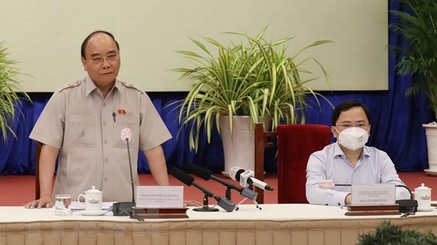 Le président Nguyên Xuân Phuc prend la parole lors de la rencontre. Photo: VNA