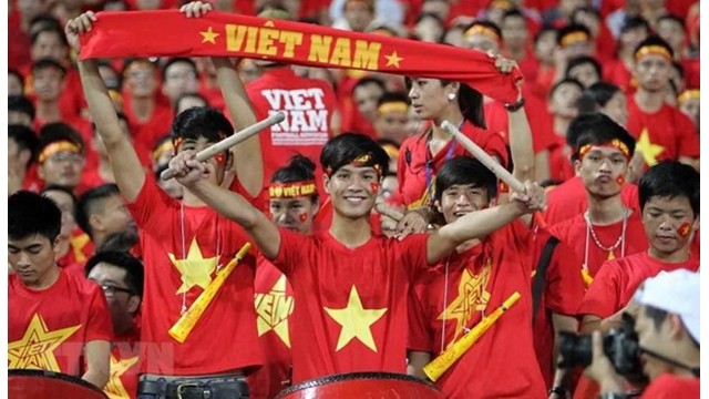 Des supporters de l'équipe nationale de football du Vietnam. Photo : VNA.