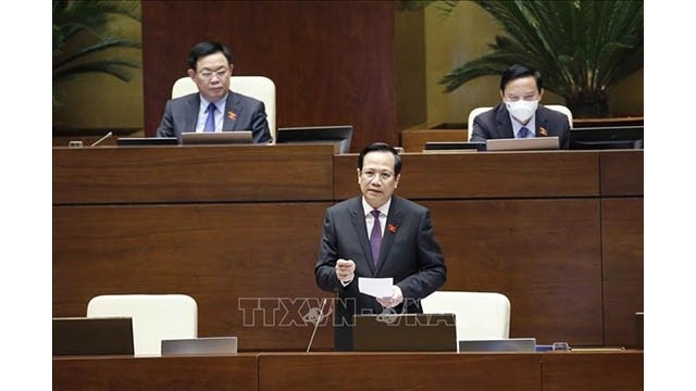 Le ministre du Travail, des Invalides et des Affaires sociales Dào Ngoc Dung devant l’Assemblée nationale Photo : VNA