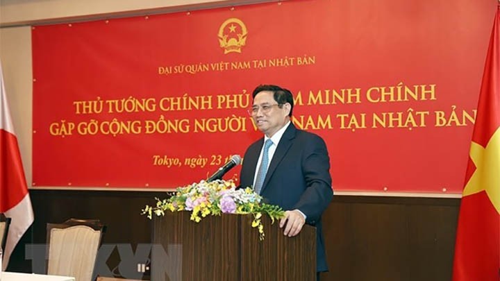 Le Premier ministre vietnamien Pham Minh Chinh rencontre la communauté vietnamienne au Japon. Photo : VNA.