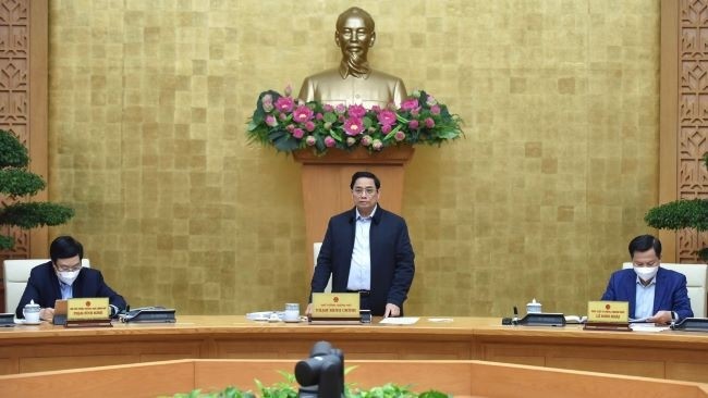 Le Premier ministre Pham Minh Chinh s'exprime lors de la réunion périodique de novembre. Photo : Trân Hai/NDEL.
