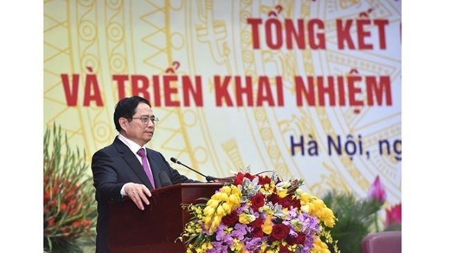 Le Premier ministre Pham Minh Chinh lors de la visioconférence organisée par le ministère de l’Intérieur, le 12 janvier. Photo : Trân Hai/NDEL.