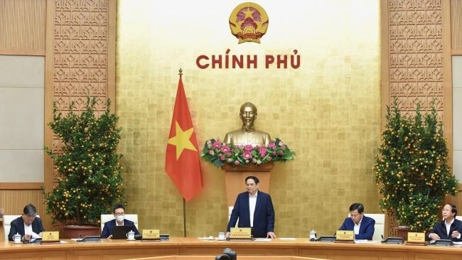 Le Premier ministre Pham Minh Chinh préside la réunion de janvier du gouvernement. Photo : Trân Hai/NDEL.