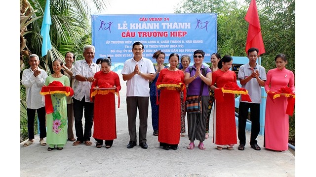 La cérémonie d'inauguration du pont de Truong Hiêp. Photo: Journal Thoi Dai 