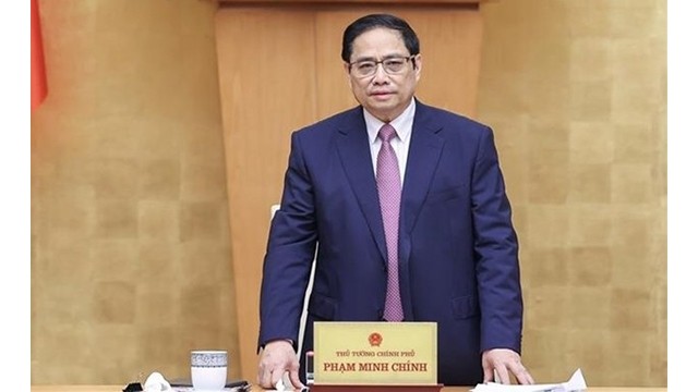 Le Premier ministre Pham Minh Chinh lors de la réunion à Hanoi, le 4 mars. Photo : VNA.