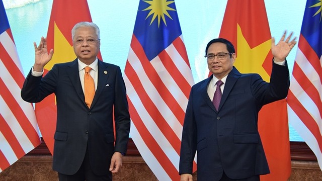 Le Premier ministre vietnamien, Pham Minh Chinh (à droite), et son homologue malaisien Dato' Sri Ismail Sabri bin Yaakob. Photo: VOV.