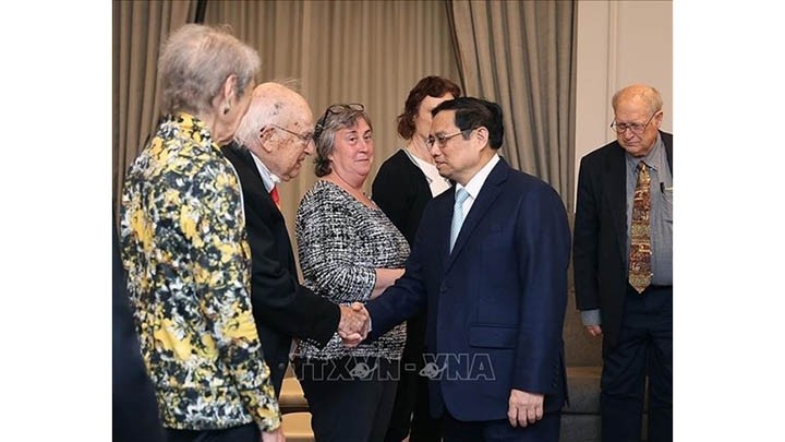 Le Premier ministre vietnamien, Pham Minh Chinh, rencontre des amis américains. Photo : VNA.