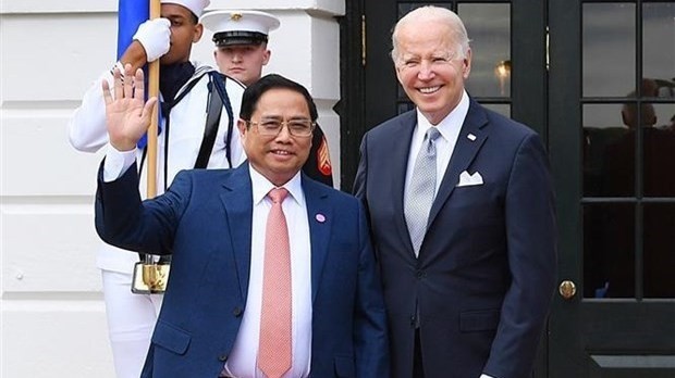 Le Premier ministre vietnamien, Pham Minh Chinh (à gauche), et le Président américain, Joe Biden. Photo : VNA.