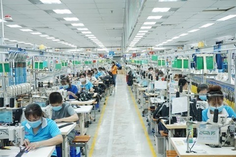 Le secteur du textile et de l’habillement a enregistré une croissance positive en 2021, avec un chiffre d’affaires de 39 milliards de dollars. Photo : VNA.