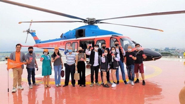 La visite en hélicoptère, un nouveau circuit proposé à Hô Chi Minh-Ville. Photo : VOV.